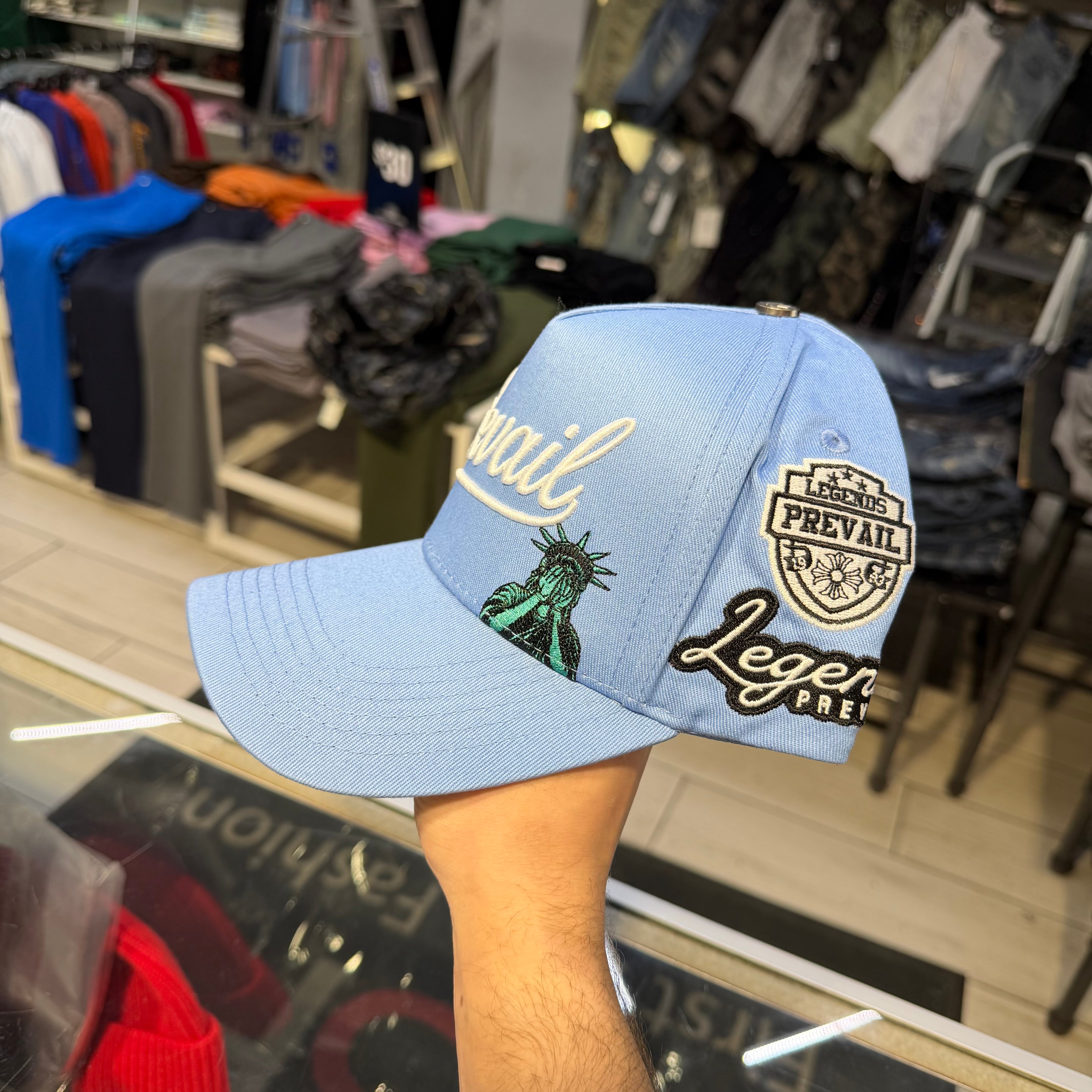 Prevail - Patch Trucker Hat - UNC Blue